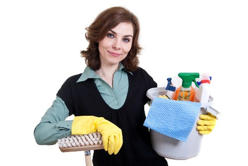 Worker estimating cubic-yard waste removal pricing